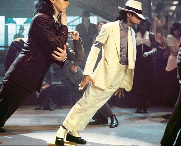 People standing together speaking about The Moon Landing Exposé: Uncovering the Evidence at the FLUENT Clothing store.